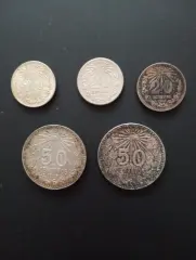 Lote de 5 monedas de plata antiguas de Mexico.